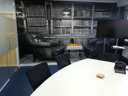 Meeting room with black and white library vinyl