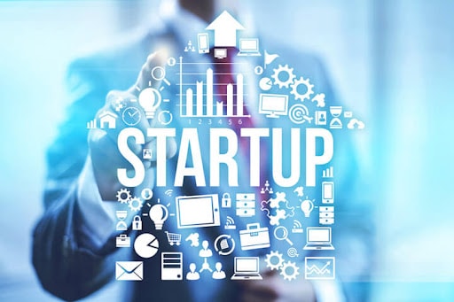 Start-up icons infront of a man wearing suit