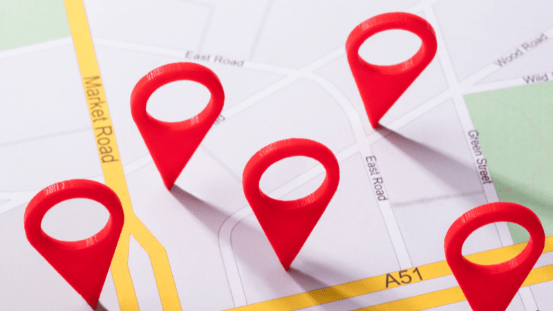 Street map with red location pins