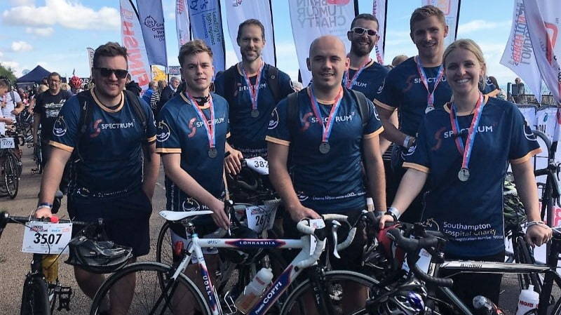 Photo of 7 staff members of Spectrum IT Recruitment after completing the London to Brighton Cycle Ride in September 2017